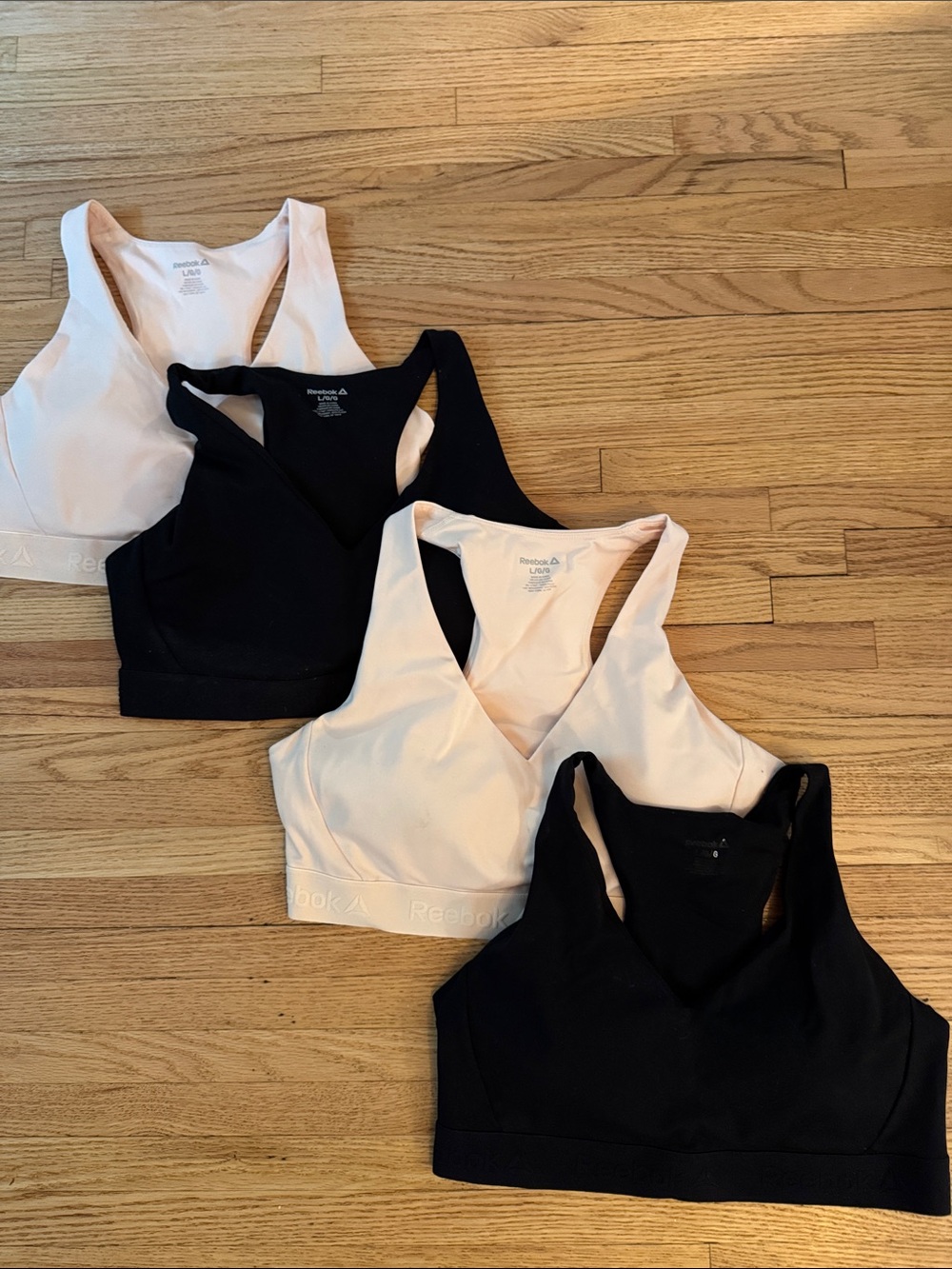 Reebok Women's Racerback Sports Bras - Black & Light Pink (Set of 4)